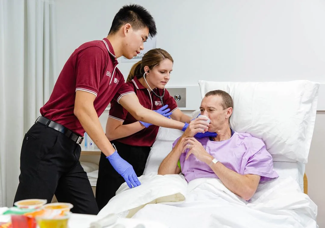 Speech pathologists supporting an adult client