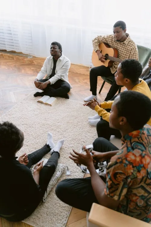 Children playing together in a group program